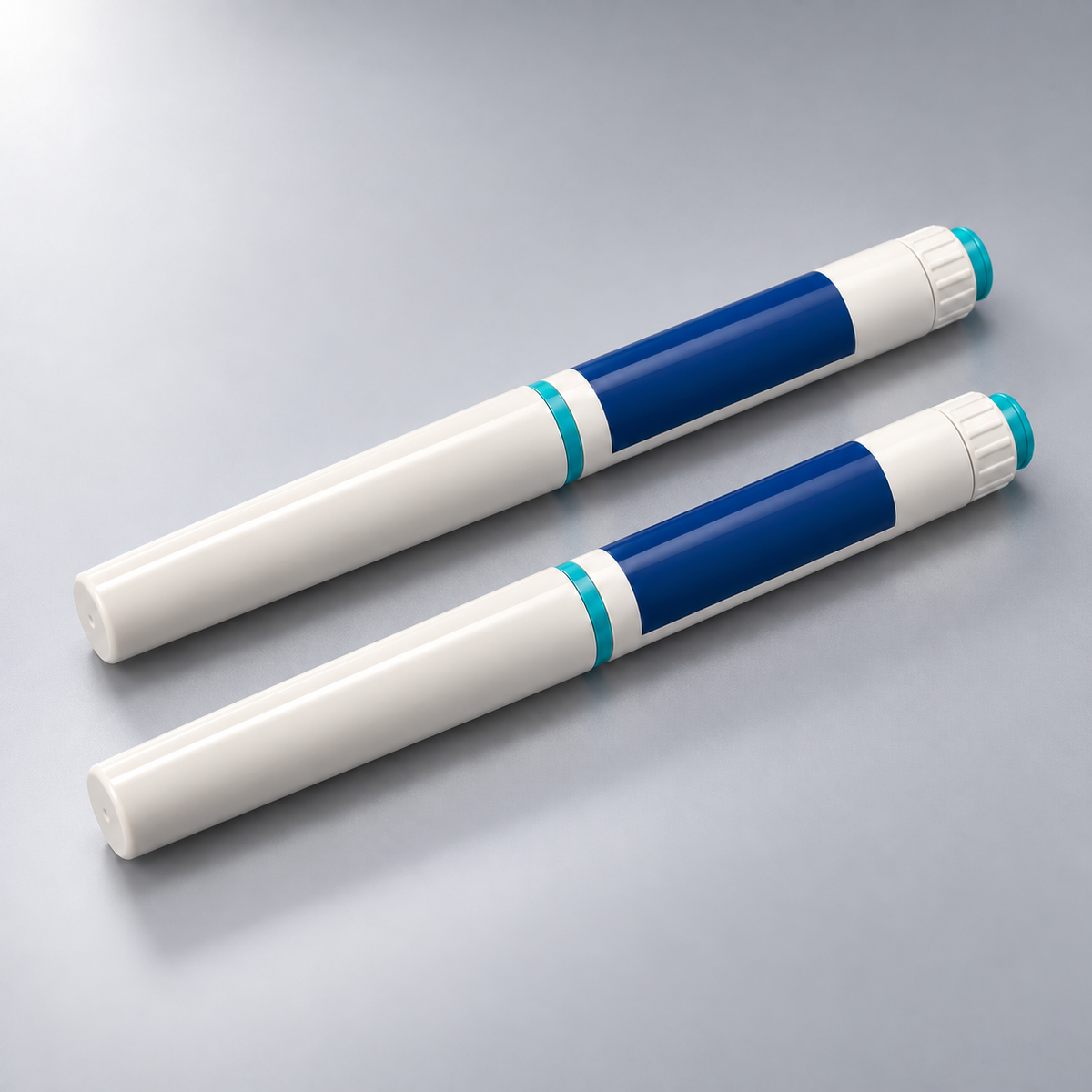 Illustrative studio view of 2 capped research pen(s)